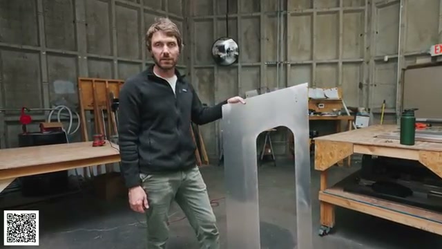 Thomas holding a formed aluminum camper part