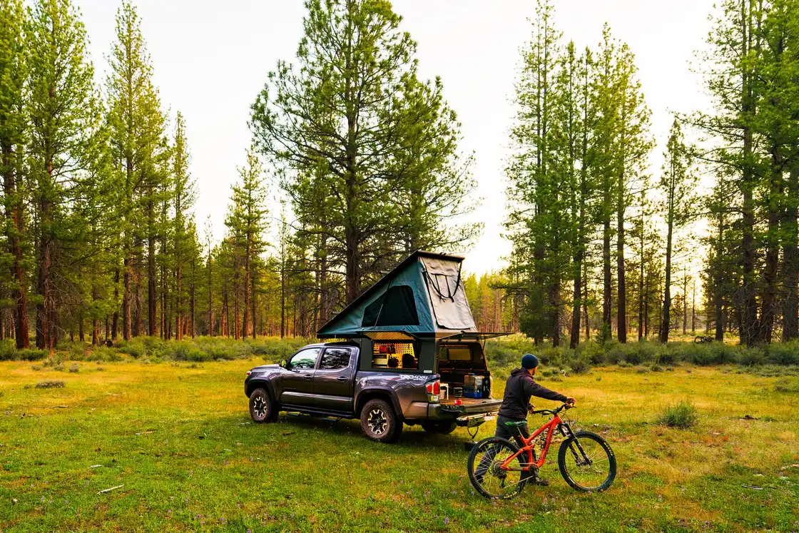 A Mesa owner using the camper at camp